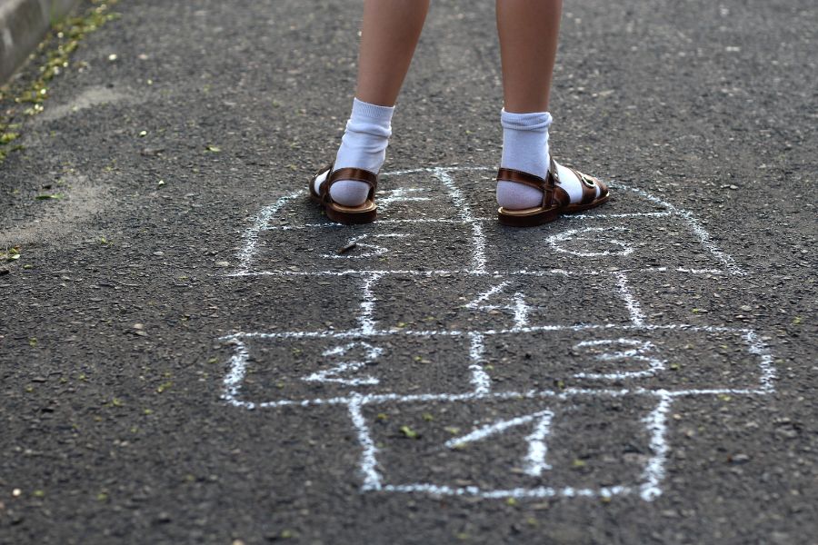 Child's feet on hopscotch